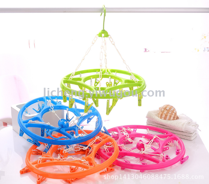 New plastic material clothes drying rack. 18-clip multi-functional clothes drying rack with outer circle and inner ring.