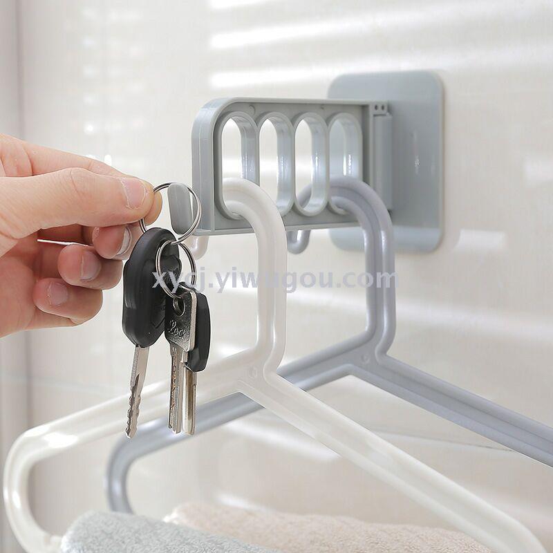 Seamless plastic hanger hook wall-mounted clothes storage rack Item Picture