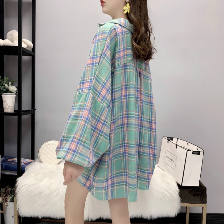The checkered shirt and avocado green coat for women are very ethereal and have a unique design details Picture