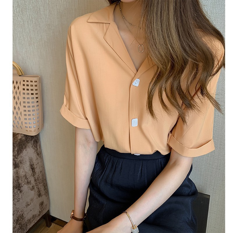 The new summer fashion and stylish white shirt for women, short-sleeved, with a unique design sense, is a loose and Korean-style shirt trend Specification image