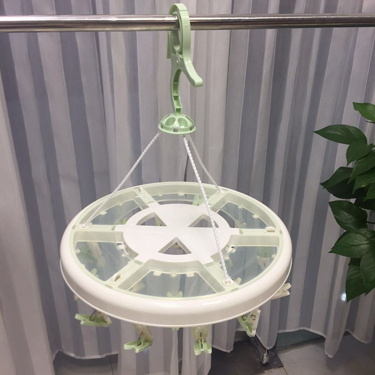Factory direct sales of household multi-functional disc clothes drying rack, multi-clip for drying baby underwear, socks and windproof clothes Application Scenario