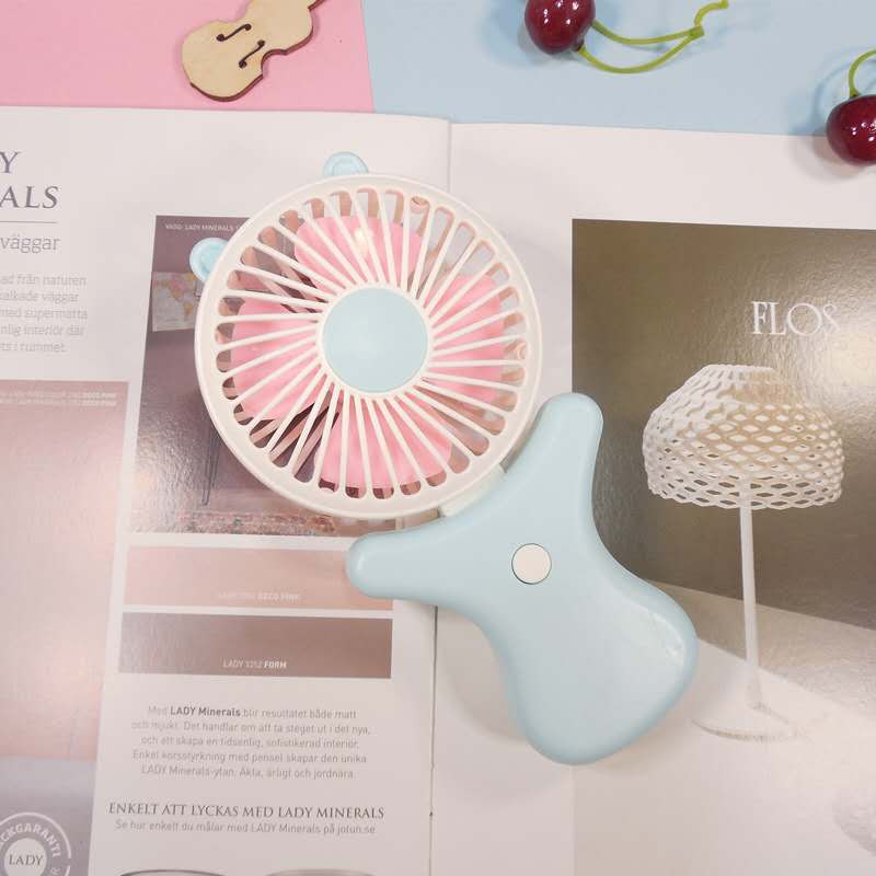 New portable handheld mini electric fan, USB folding charging fan, summer cartoon usb fan Application Scenario