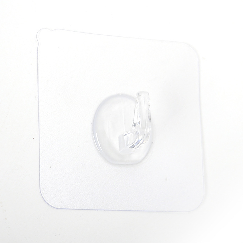 The transparent plastic hook leaves no trace behind the door, and the adhesive hook is pasted on the kitchen wall. It is a powerful nail-free magic hook with ox horn stickers Item Picture