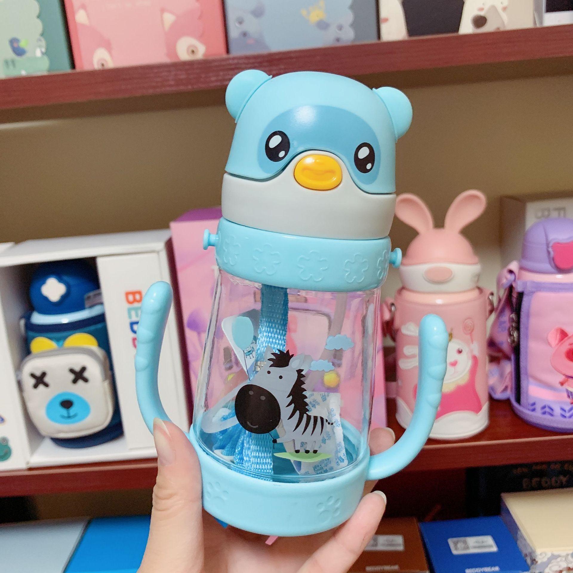 The new Bear children's straw cup with shoulder strap and handle is a dual-purpose baby drinking cup Application Scenario