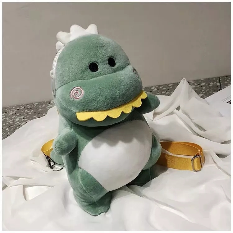 New cartoon and cute dinosaur backpacks, plush bags, figurines, women's crossbody bags and children's dolls are selling well details Picture