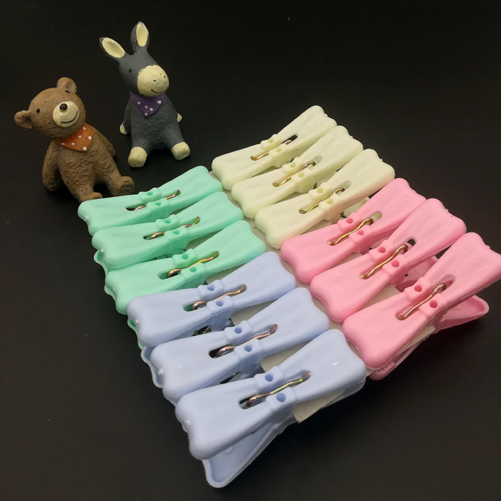 N2013 133# Twelve bow tie clothes clips, plastic quilt clips, drying quilt clips, Yiwu 2-yuan 2-yuan store department store details Picture