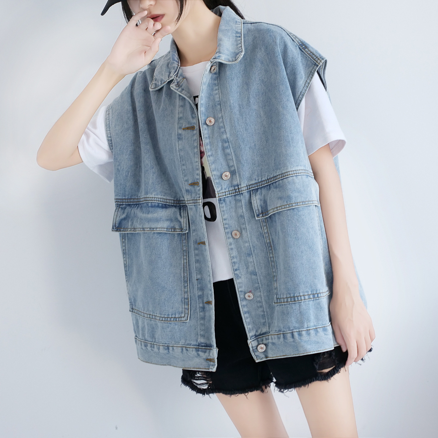 The Spring and Autumn trendy denim vest for women is a loose European-style outerwear that goes well with all kinds of outfits. The Korean-style sleeveless vest work jacket is trendy on Instagram Specification image