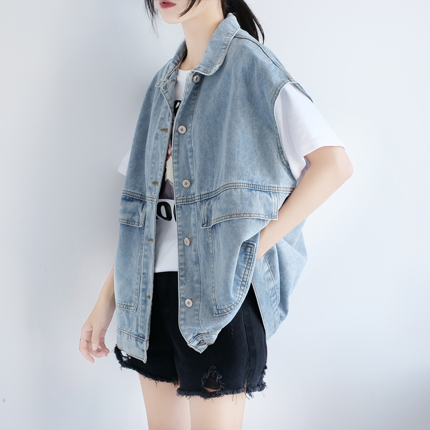 The Spring and Autumn trendy denim vest for women is a loose European-style outerwear that goes well with all kinds of outfits. The Korean-style sleeveless vest work jacket is trendy on Instagram