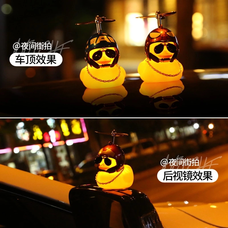 The new "Little Yellow Duck" helmet reflective rearview mirror breaks through the wind and charges forward. Social duck car ornaments are selling well at street stalls details Picture
