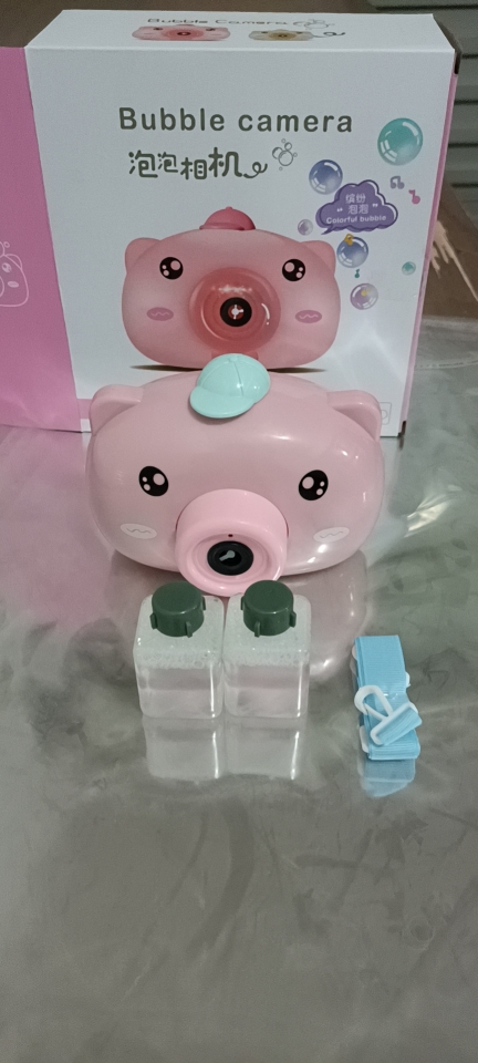 New best-selling products are being purchased through group buying and directly sold. The wholesale of the electric piglet bubble machine with a hat is selling well at street stalls Specification drawing