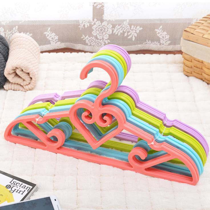 Modern simple plastic daily use department store orange coat hanger agent