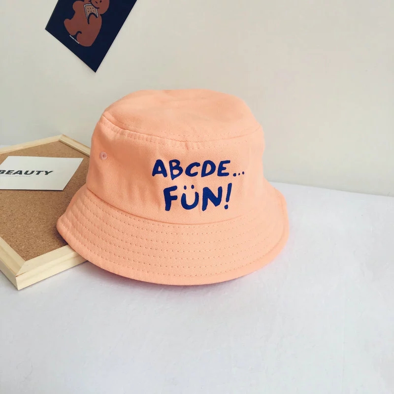 Korean InS-style solid-color lettered children's sunshade fisherman hat for spring and summer, new trendy men's and women's flat-topped basin hat ht Application Scenario
