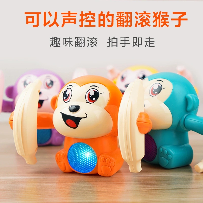 Electric tipping monkey, voice-controlled sensor cartoon rolling banana monkey, light and music children's toys are selling well at the street stall full figure