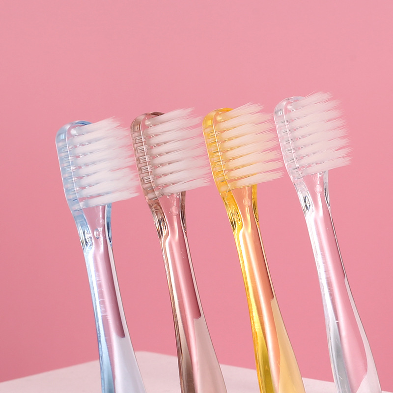 A 4-tube macaron set in a solid-color transparent crystal box with a small head, the same style of adult fine soft-bristled toothbrush as Muji in Japan Application Scenario