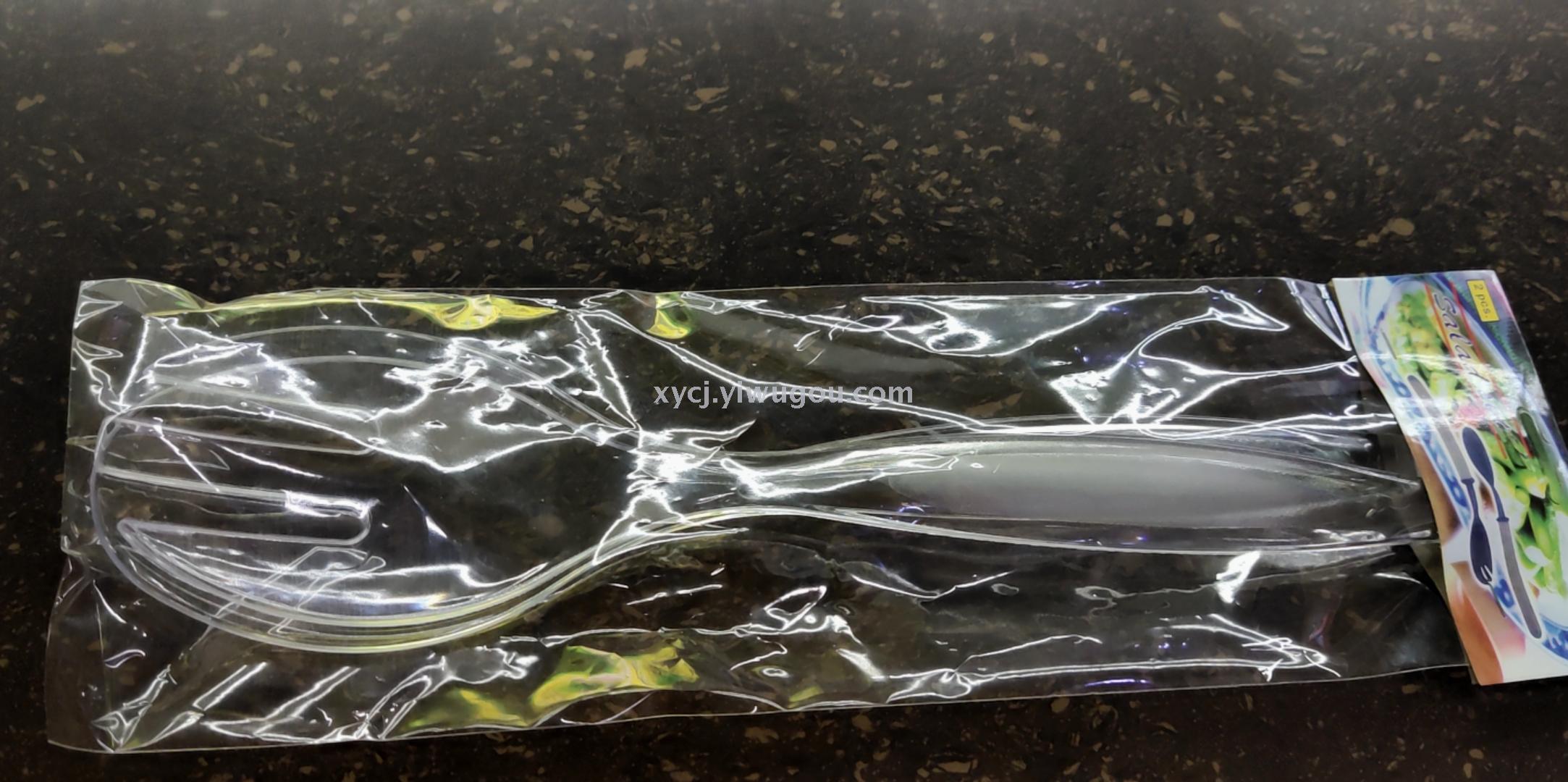 Transparent large salad spoon for salad stirring