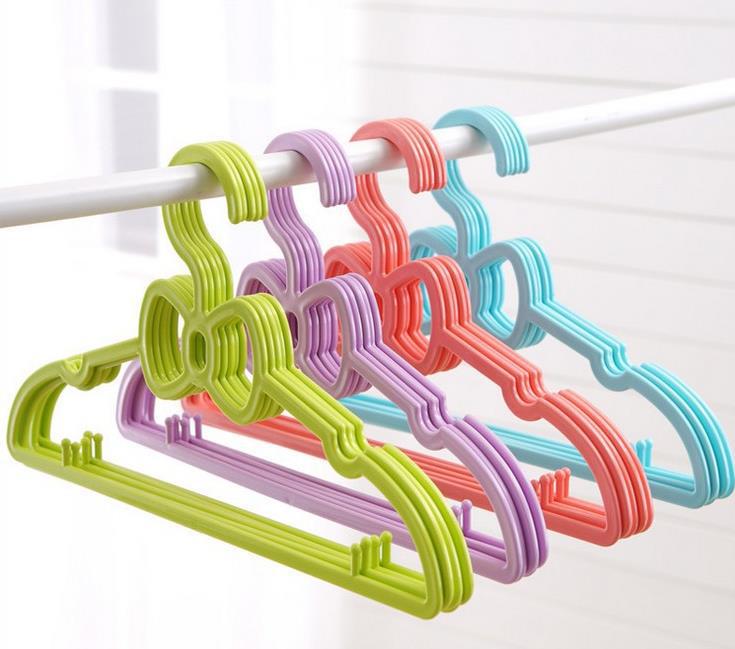Tienda diaria de plástico moderno y simple verde percha de fábrica directa