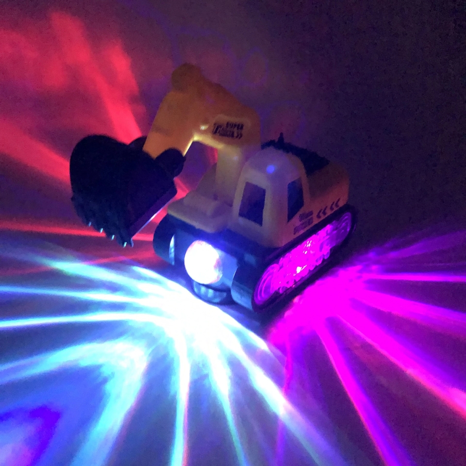 Electric universal music luminous plastic excavator model toy, children's toy, educational engineering vehicle model Application Scenario