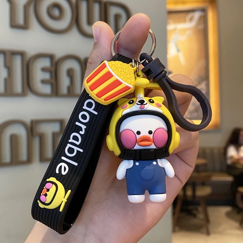New best-selling helmet, duck keychain, creative and cute schoolbag pendant, couple car keychain ring gift Item Picture