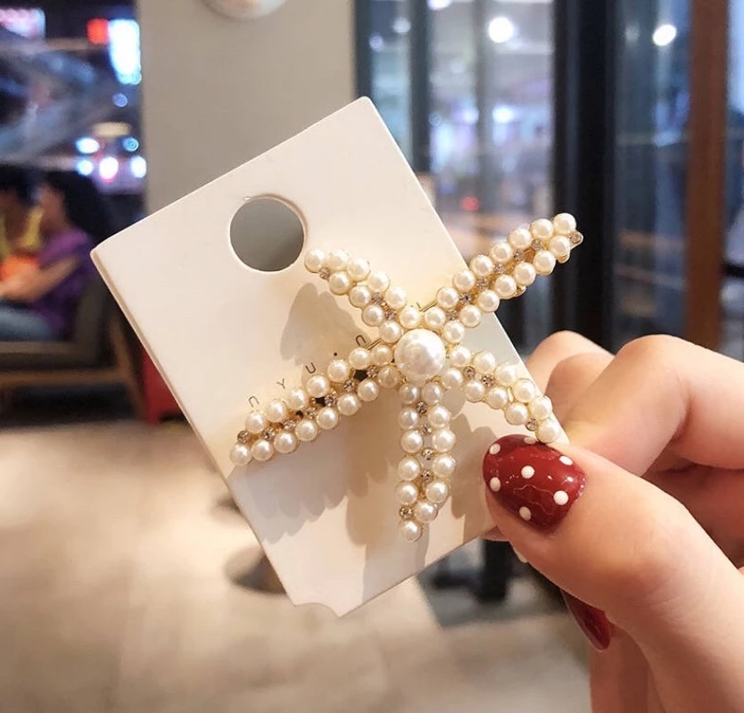 The new Korean version of ins starfish pearl full diamond hair clips, women's hair accessories, bangs clips and fairy hair clips are selling well details Picture
