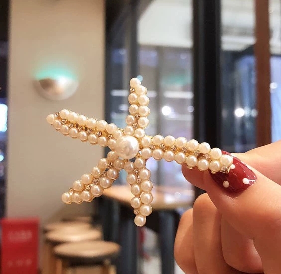 The new Korean version of ins starfish pearl full diamond hair clips, women's hair accessories, bangs clips and fairy hair clips are selling well Application Scenario