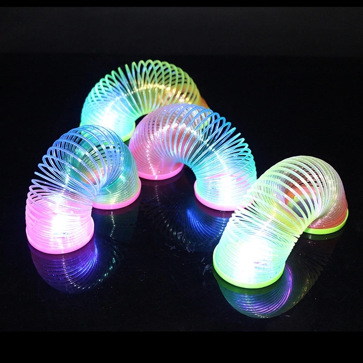 The street stall is selling popular toys such as luminous rainbow rings, 3D magic rainbow rings, flashing spring rings and magic rings details Picture