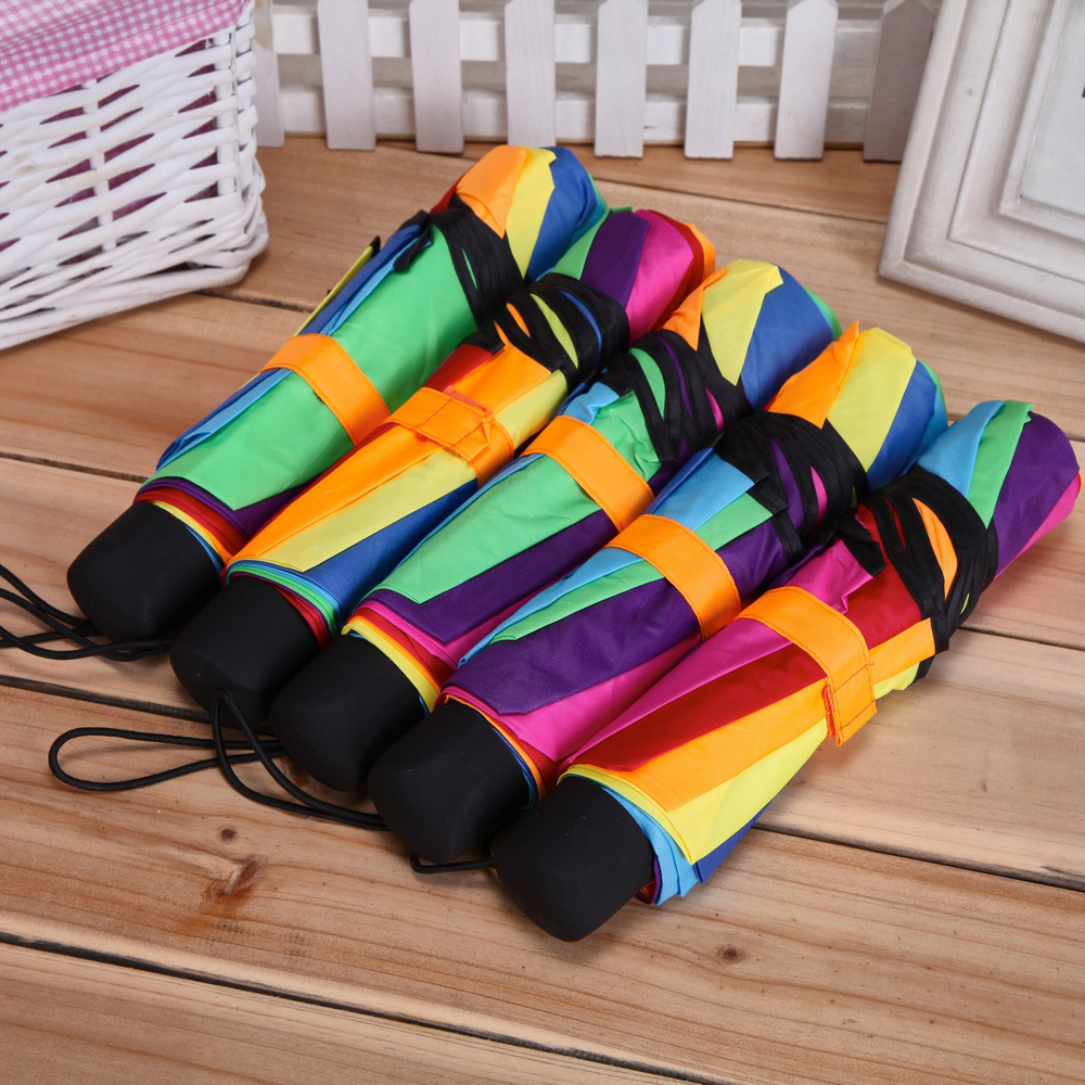 Baked black paint Apollo Rainbow folding umbrella with ruffled edge decoration, a creative three-fold umbrella for both sunny and rainy days Application Scenario