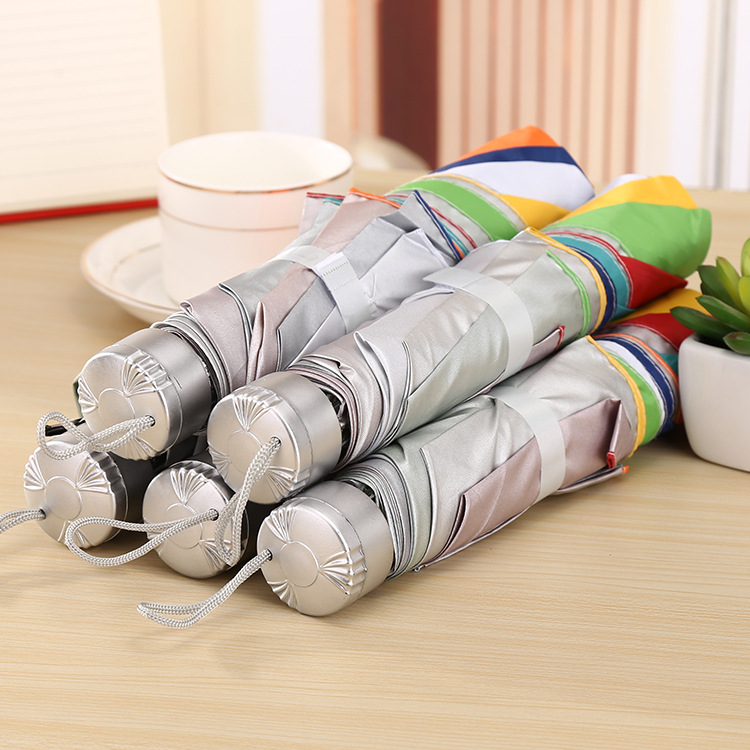 Korean version creative umbrella manufacturer direct sales portable rainbow silver gel sun protection umbrella gift advertisement folding umbrella