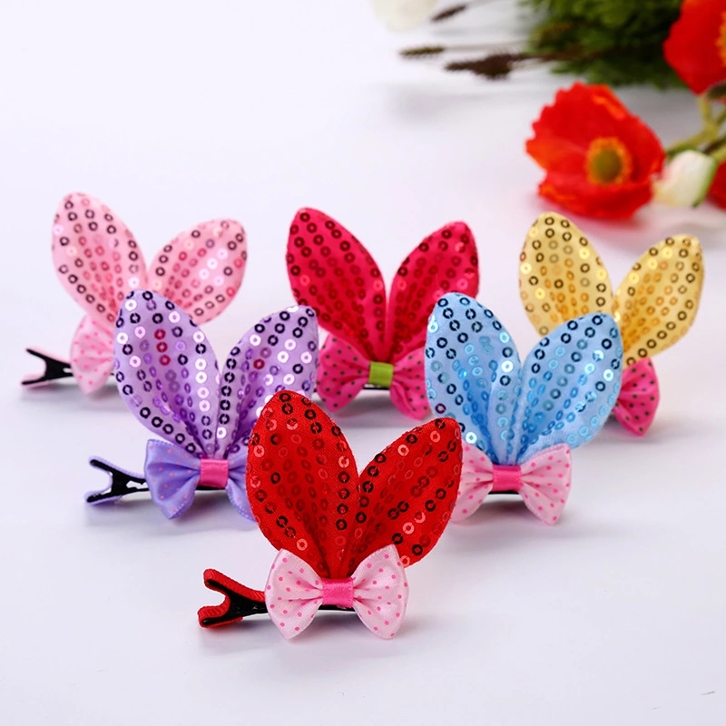 Korean girls' cute children's hair accessories, adorable cartoon rabbit ear bows, baby hair clips and headwear wholesale are selling well full figure