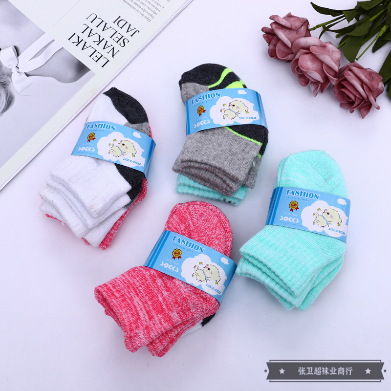 Soft, comfortable and breathable cotton mid-calf baby socks for infants and children aged 0-8, in multiple colors, suitable for both boys and girls