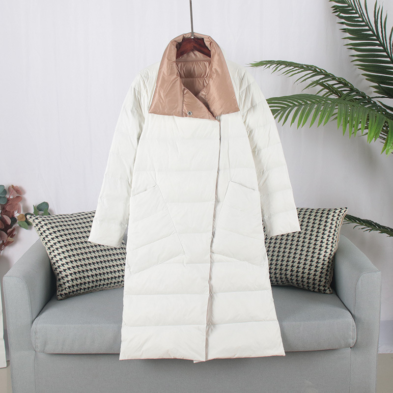 The 2019 winter new down jacket for women, mid-length, knee-length, double-sided wear, white duck down, a bestseller, slim-fit, large-sized coat, is in vogue