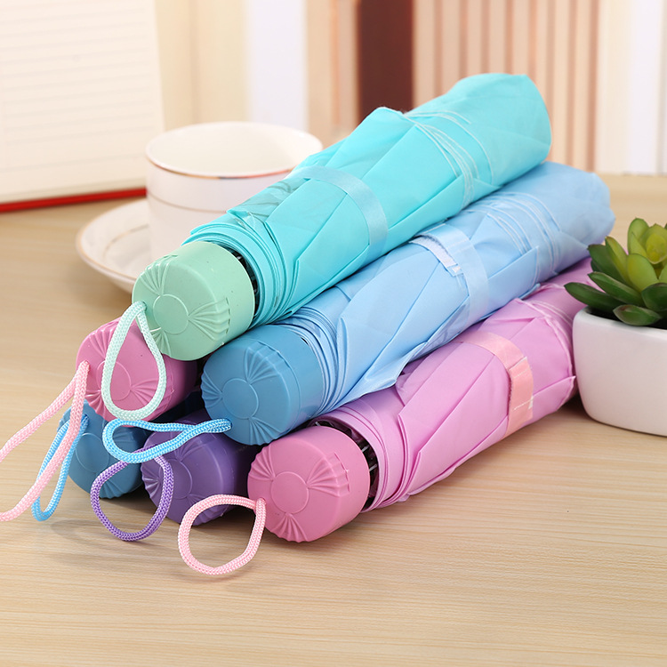 Wholesale of three-fold umbrellas, creative candy-colored inverted pole pearlescent umbrellas, manual couple style, short-handled, all-weather and all-weather advertising umbrellas details Picture