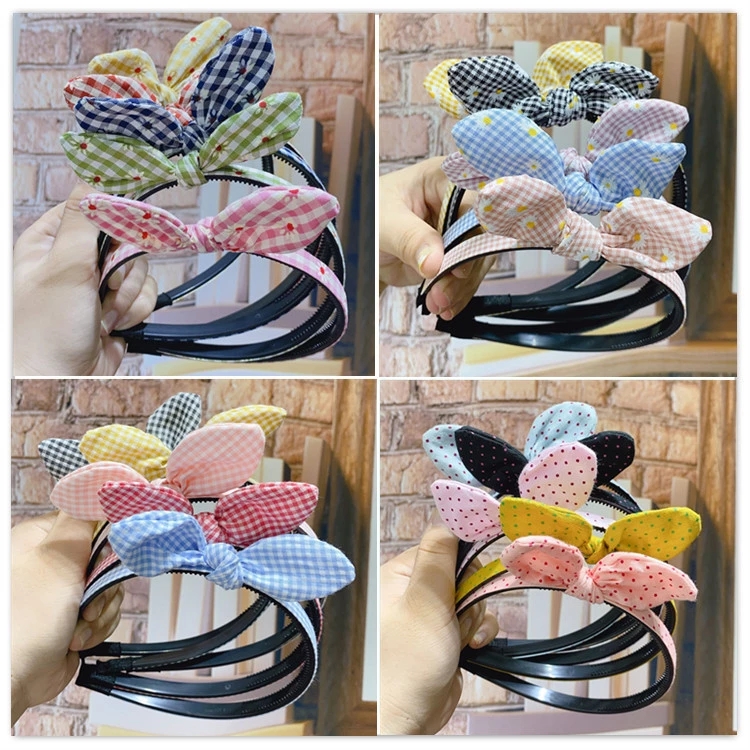 The Korean forest style fabric rabbit ears Zou Ju face wash hair band is a versatile outdoor headwear for girls. The hair clip and headband are selling well full figure