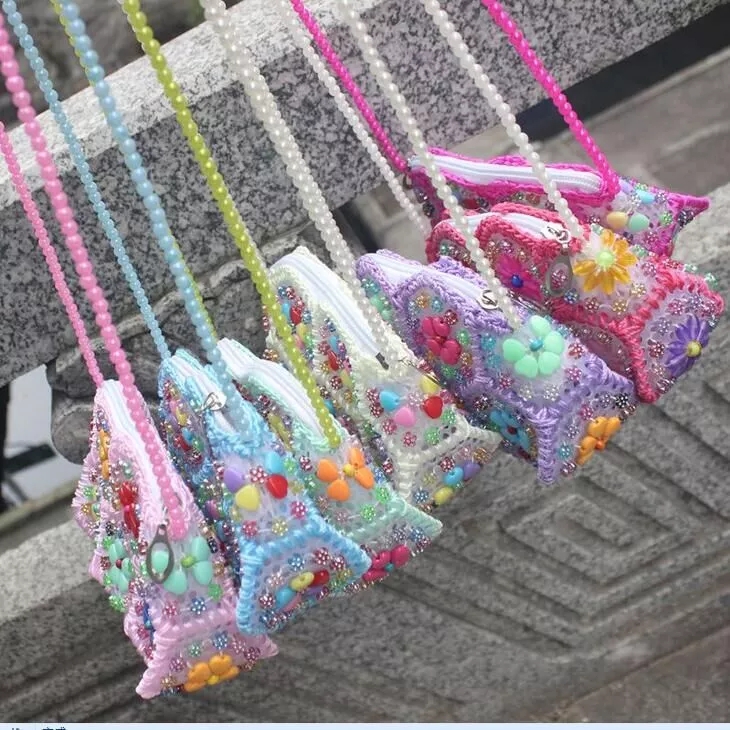 Wholesale women's bags, single-shoulder hand-carry women's bags, Yunnan handcrafted pearl bags, seven-color sixteen-piece pearl flower coin purifiers full figure