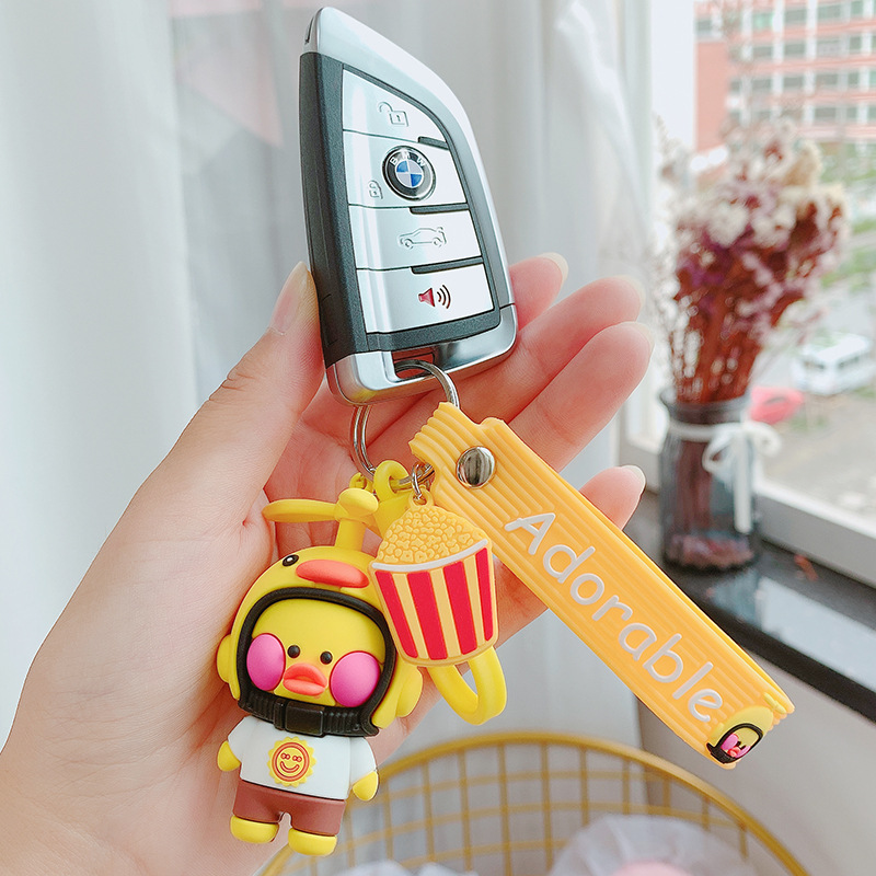 Wholesale of popular helmet duck cartoon keychains, cute car key pendants, creative girls' schoolbag pendants and gifts Application Scenario