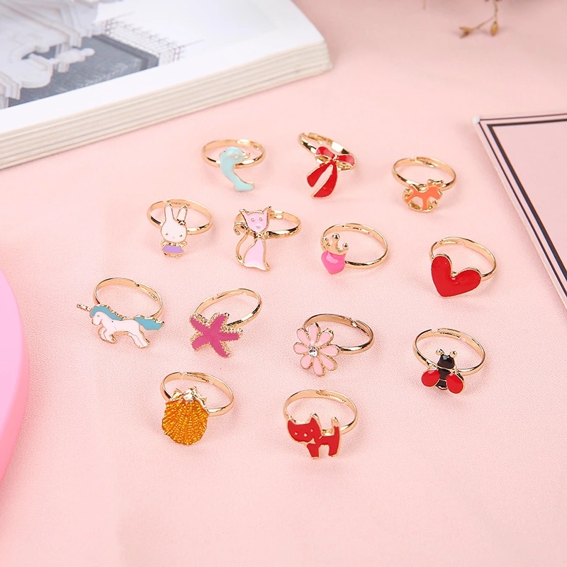The new Korean-style alloy cartoon children's rings are cute and beautiful, with mixed styles and colors and random loose packaging, selling well at street stalls details Picture