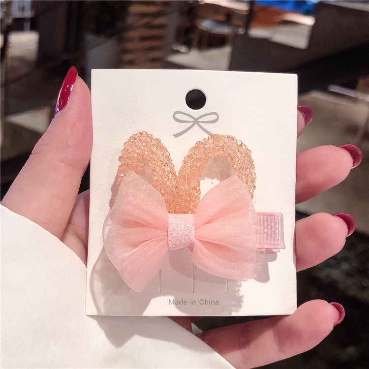 The new cute style of the ins rabbit-ear rhinestone hair clip and the girlish bow side clip headwear details Picture