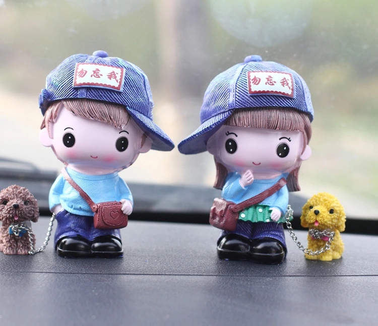Wholesale of new forget-me-not dog-hugging couple dolls, dog-walking stroller ornaments, dog-hugging children's car interior accessories details Picture