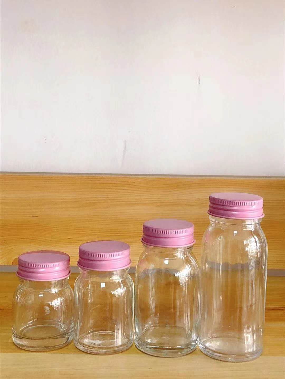 Round aluminum cover glass bird's nest bottle health care products bottle packaging bottle