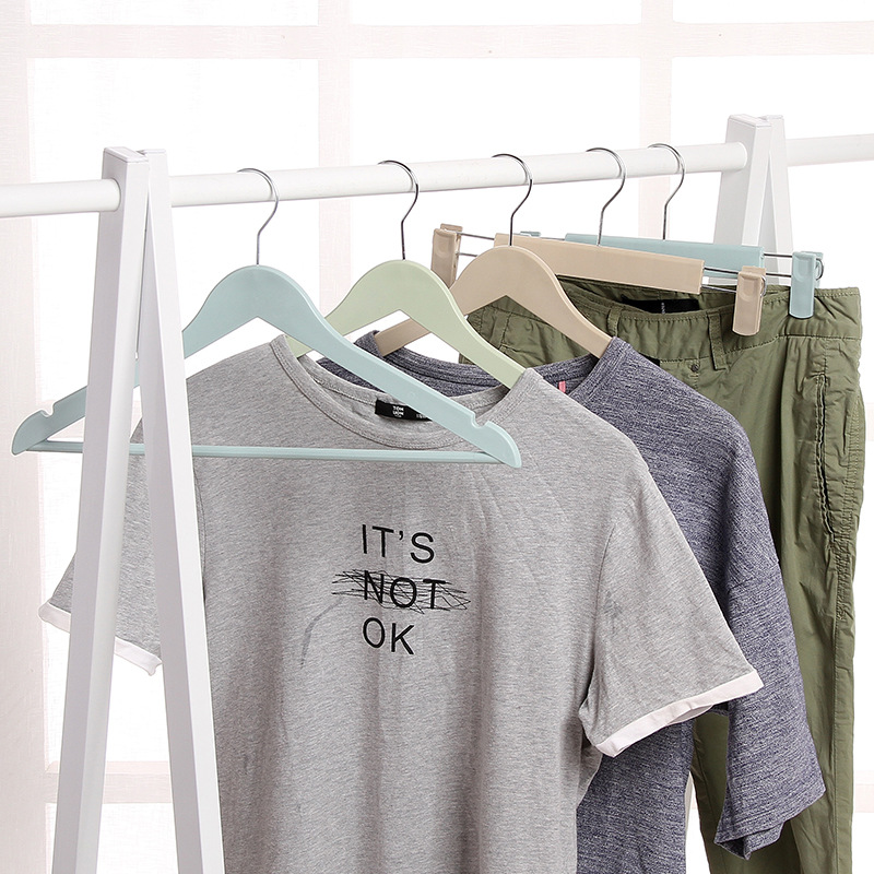 Wholesale of best-selling anti-slip colored plastic frosted clothes drying racks and trouser racks from the manufacturer, with extendable trouser clips Item Picture