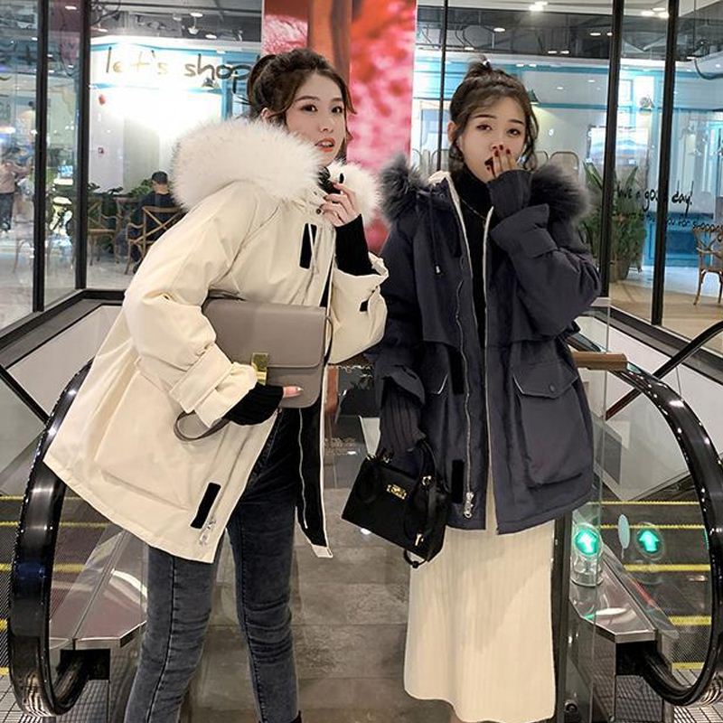 Women's mid-length down jacket 2020 Winter new style Korean version fashionable fox fur large collar loose down jacket details Picture