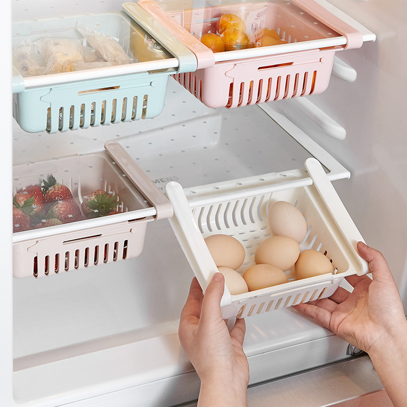 The refrigerator's fruit storage basket is a water-draining and retractable box with drawer-type partitions. As shown in the picture, the box is classified in a Nordic style