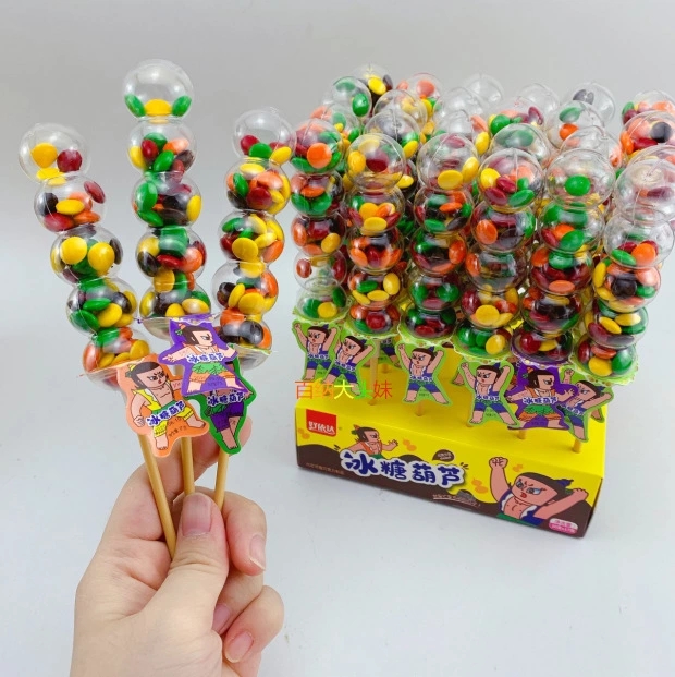 Hao Yida's sugar-coated haws, sugar-coated haws, chocolate candies, chocolate beans, candies and snacks are selling well at the street stall details Picture