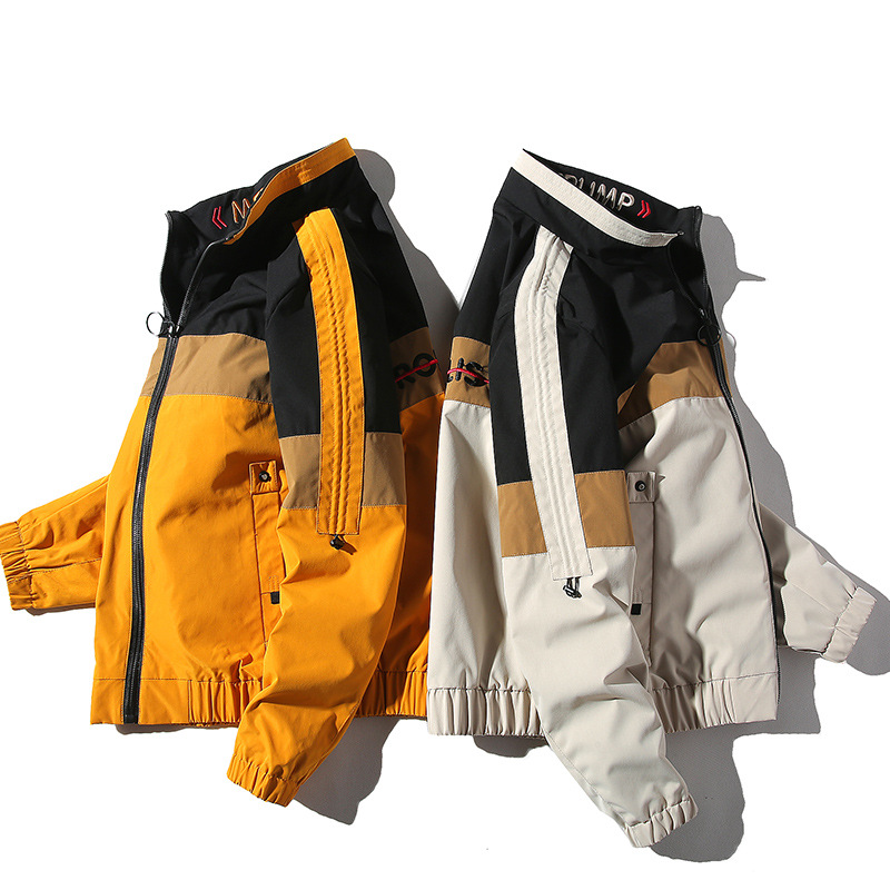 The 2020 autumn new stand-up collar casual trendy brand versatile top jacket for men, featuring a patchwork letter embroidery men's jacket