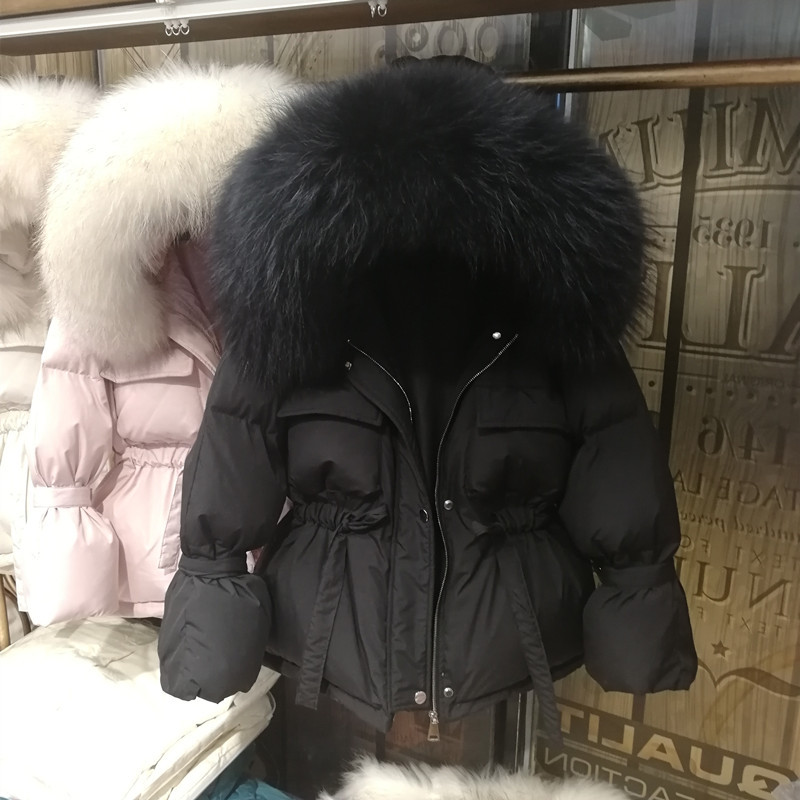 The new Dongdaemun casual short hooded princess with a large fur collar and flared sleeves fitted hooded thick down jacket details Picture