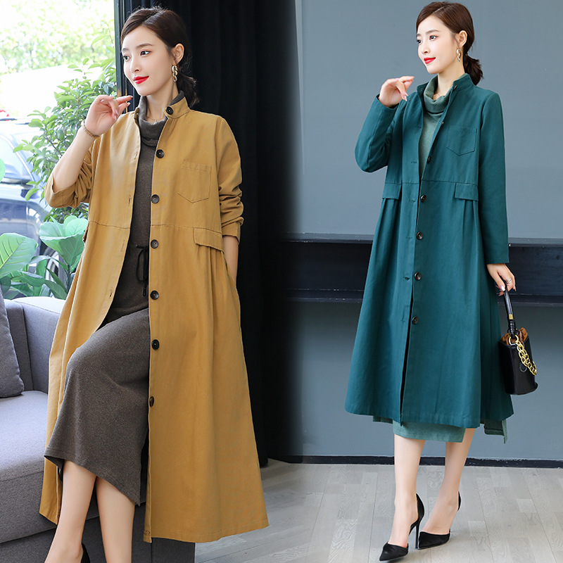 The new autumn 2020 trench coat for women is elegant and stylish. It's a middle-aged mother's overcoat and a long, short coat