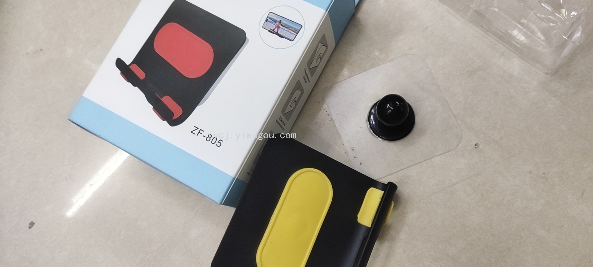 Wall-mounted adhesive phone stand