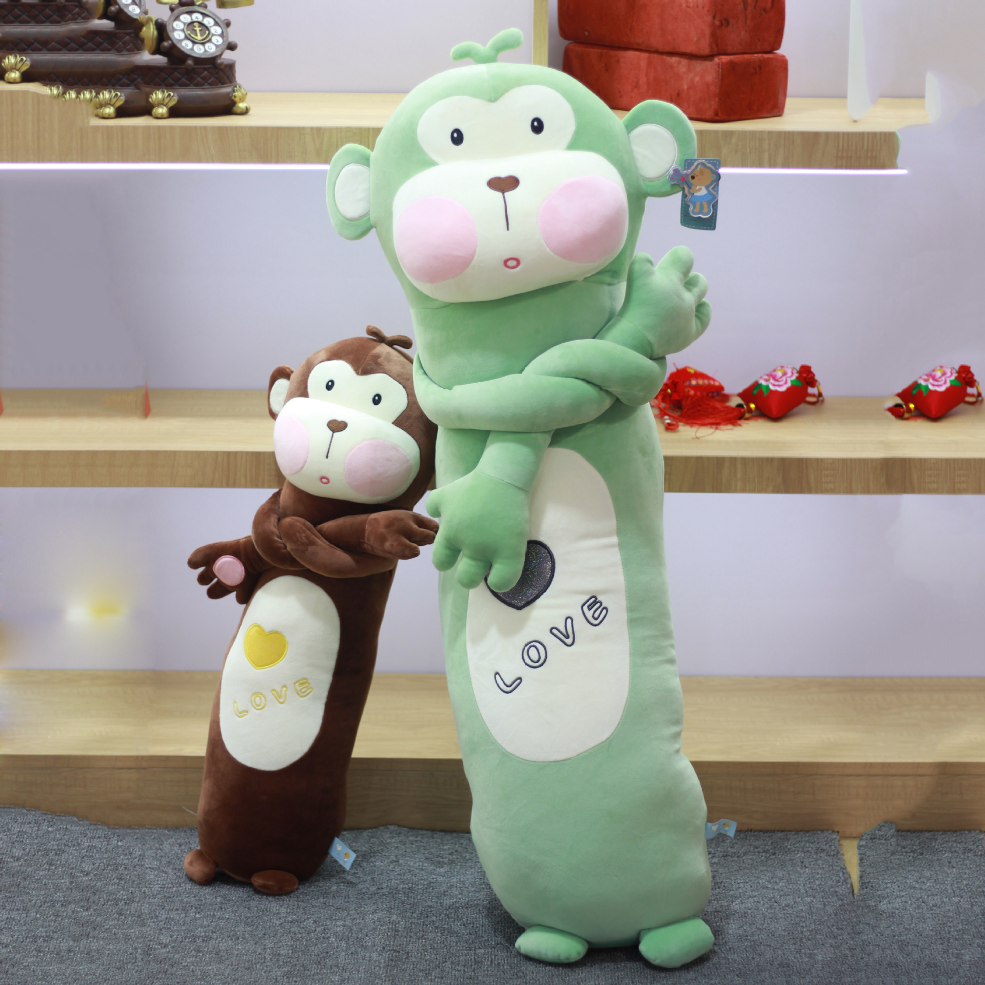 Cute, long-bodied monkey plush toy figurines are in stock. New styles are selling well and can be given as Children's Day birthday gifts Specification drawing