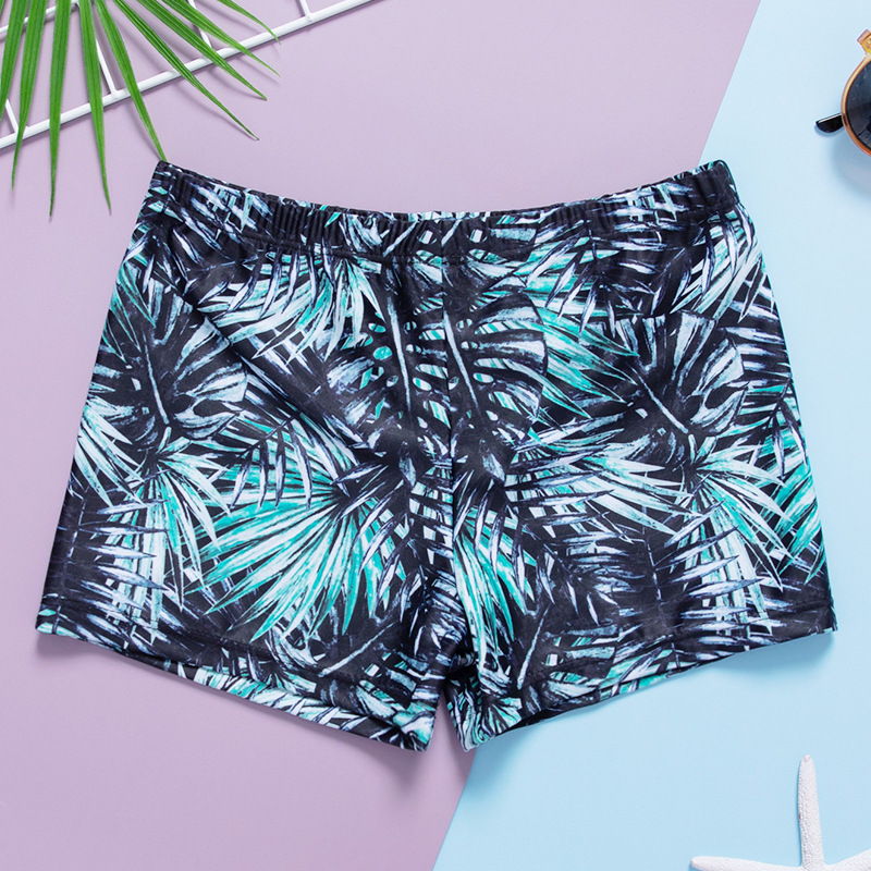 European and American cartoon-printed swimsuits and Korean-style green leaf children's swimming trunks for export