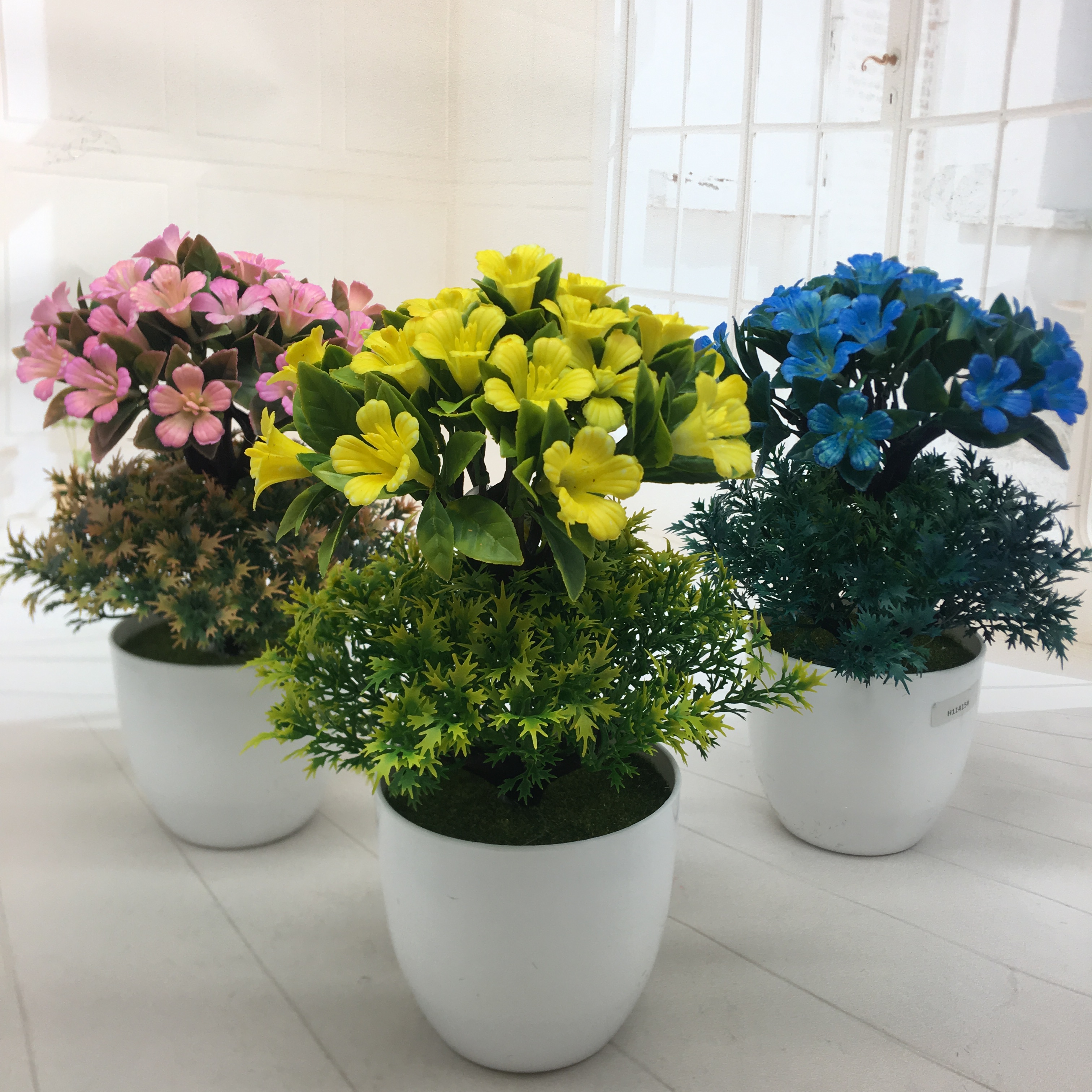 Mini artificial bonsai flowers, small potted plants, factory direct sales of artificial flower plants Item Picture