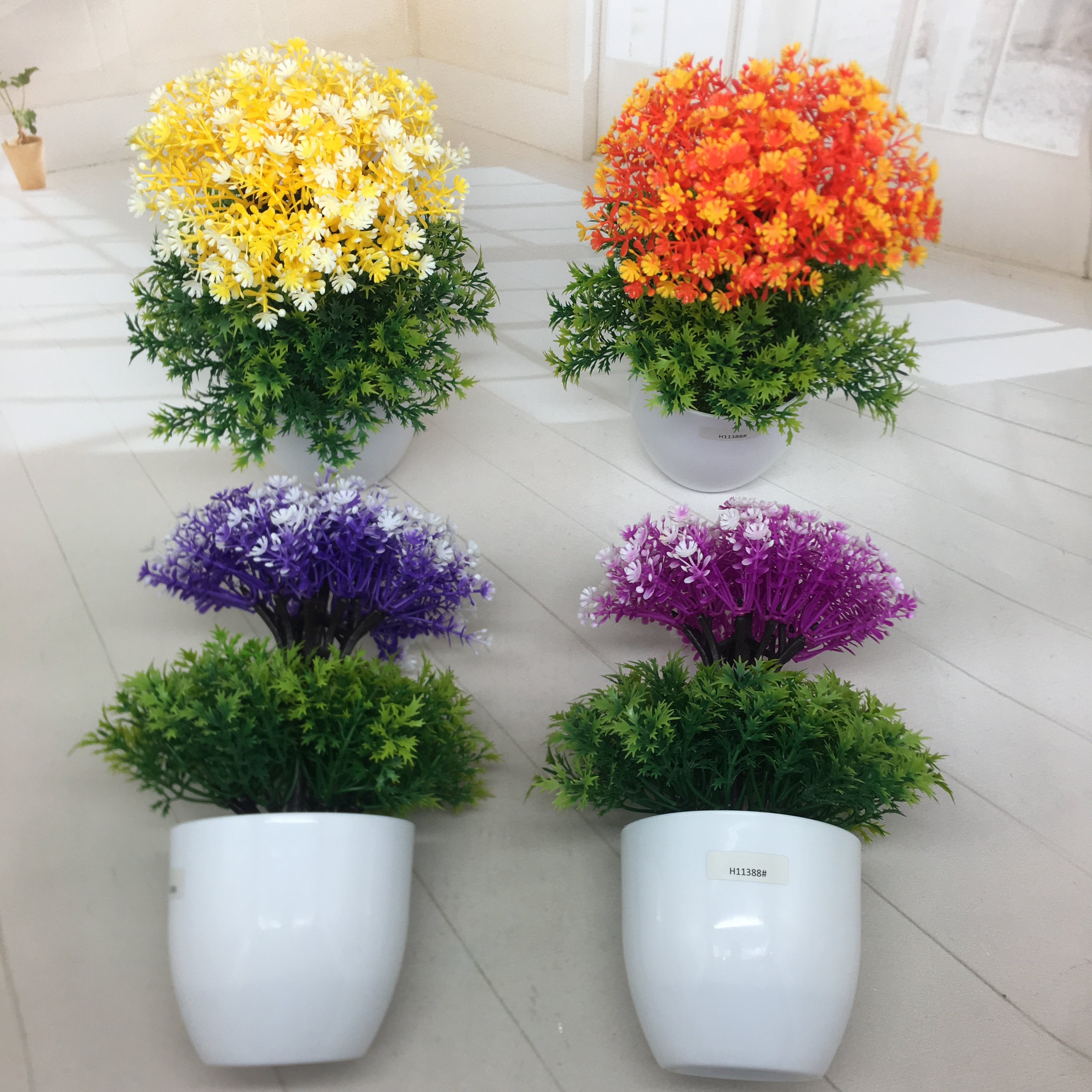 Mini artificial bonsai flowers, small potted plants, factory direct sales of artificial flower plants Item Picture